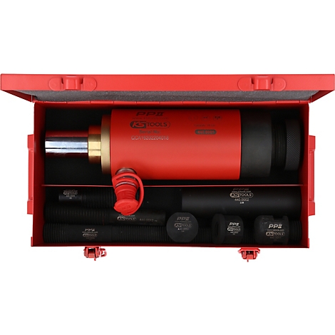 Rote Werkzeugkiste mit Hydraulikzylinder und Zubehör. Alle Teile sind übersichtlich angeordnet.